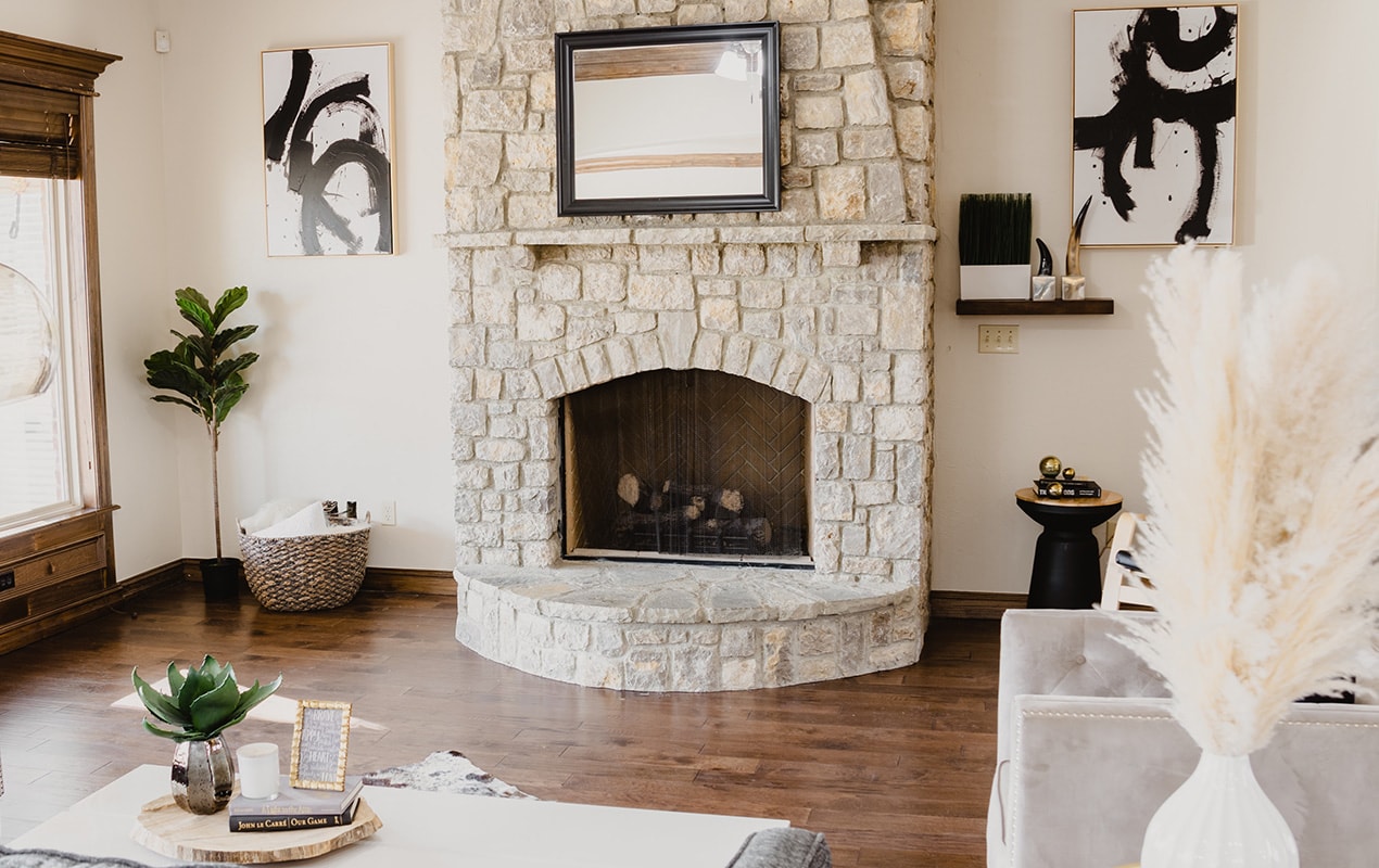 Rustic living room design with stone fireplace