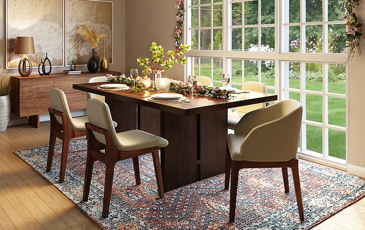 Wooden dining table with table decor and serveware