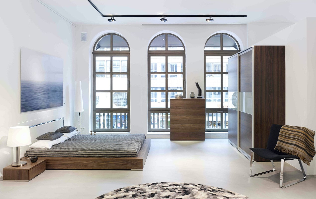 Bedroom interior with bed and wardrobes