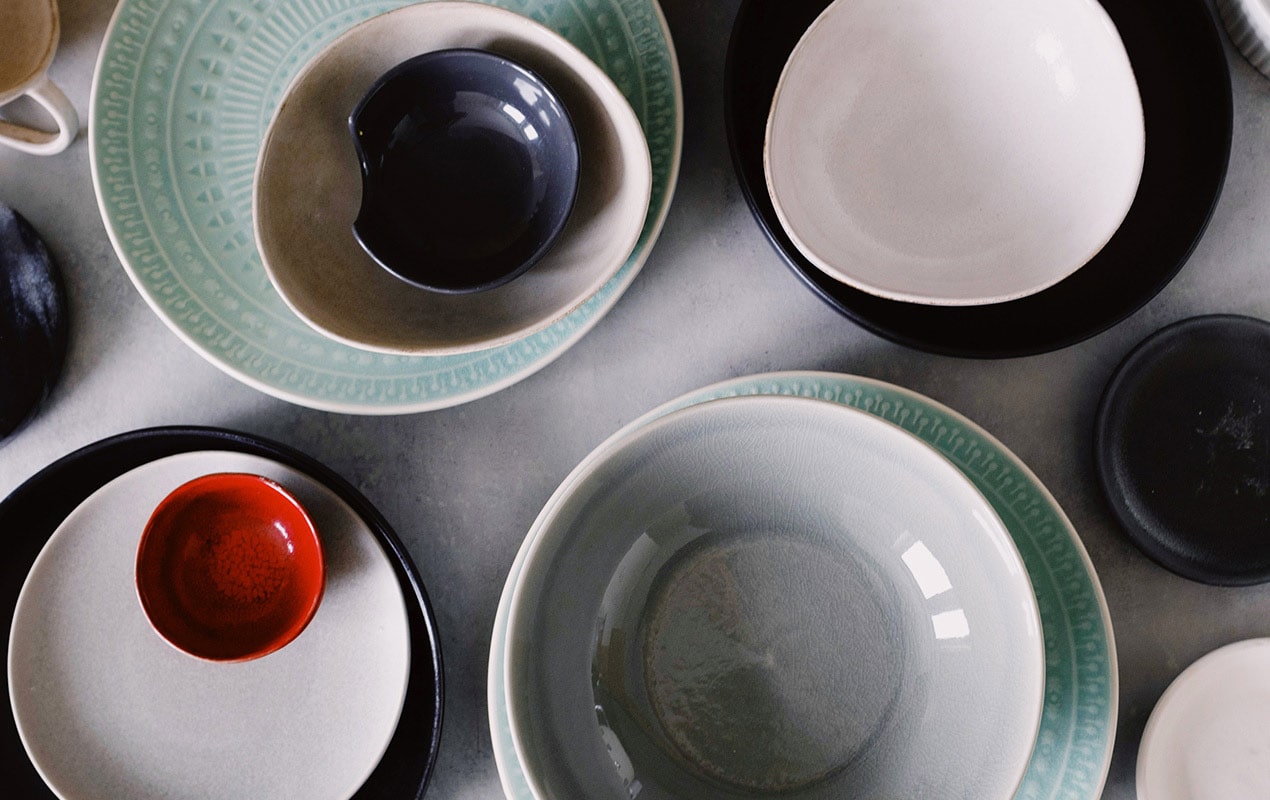 Colorful porcelain kitchen bowls in different sizes