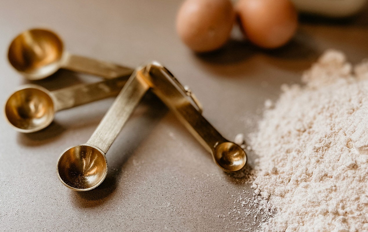Measuring Spoon with eggs and flour