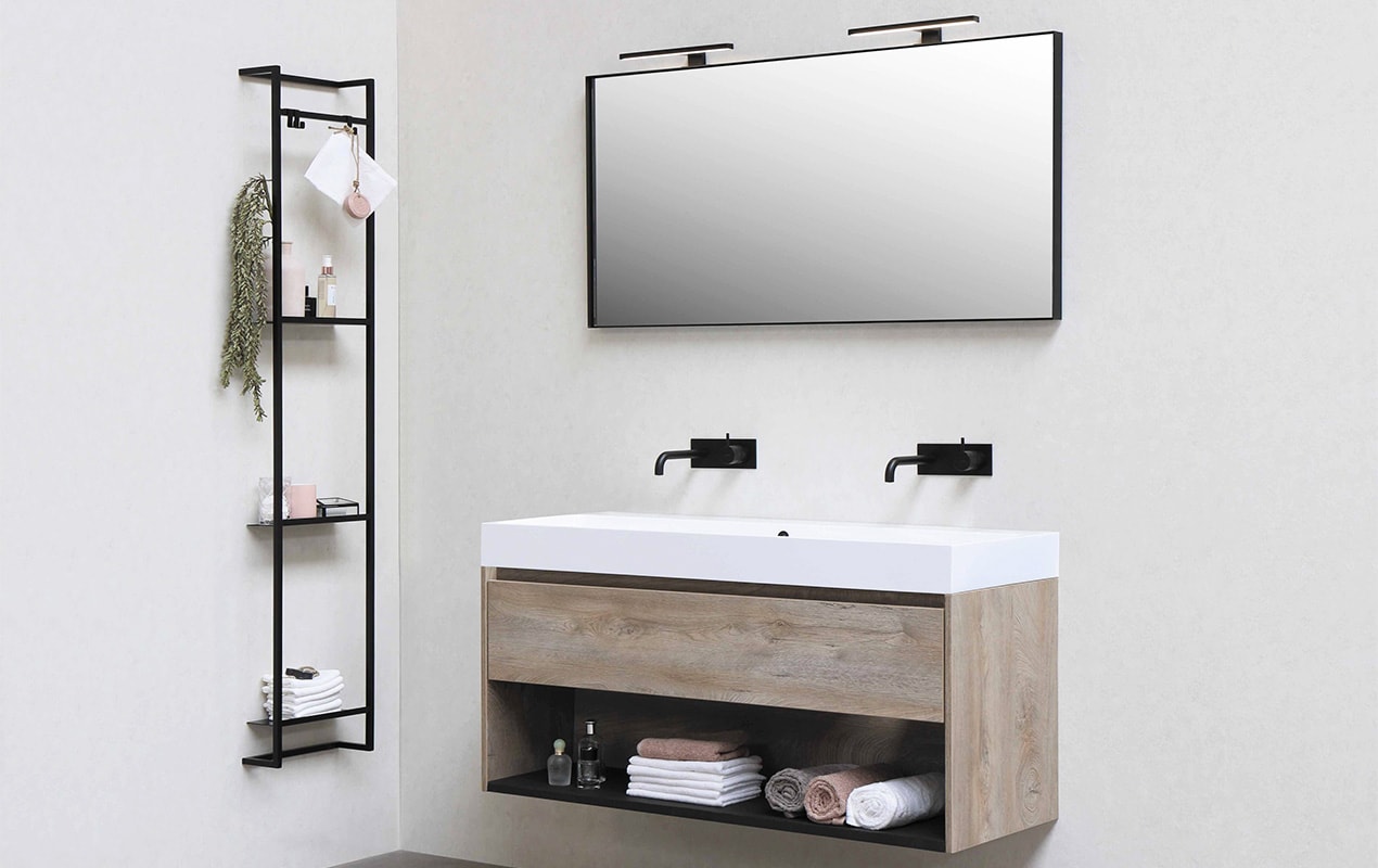 bathroom interior with sink, faucet, mirror, and wall rack 