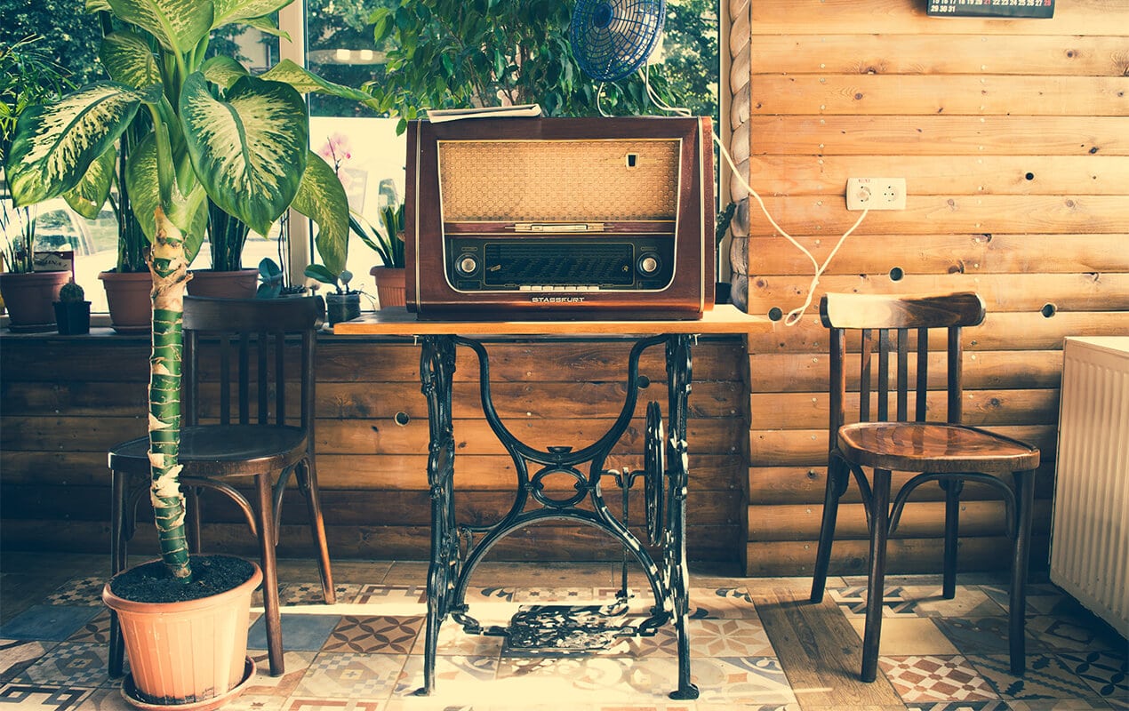 Vintage tiled floor with an antique radio on a table