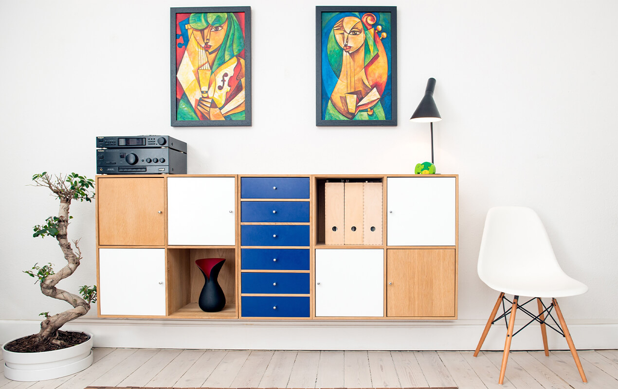 Living space with wood cabinets and framed art