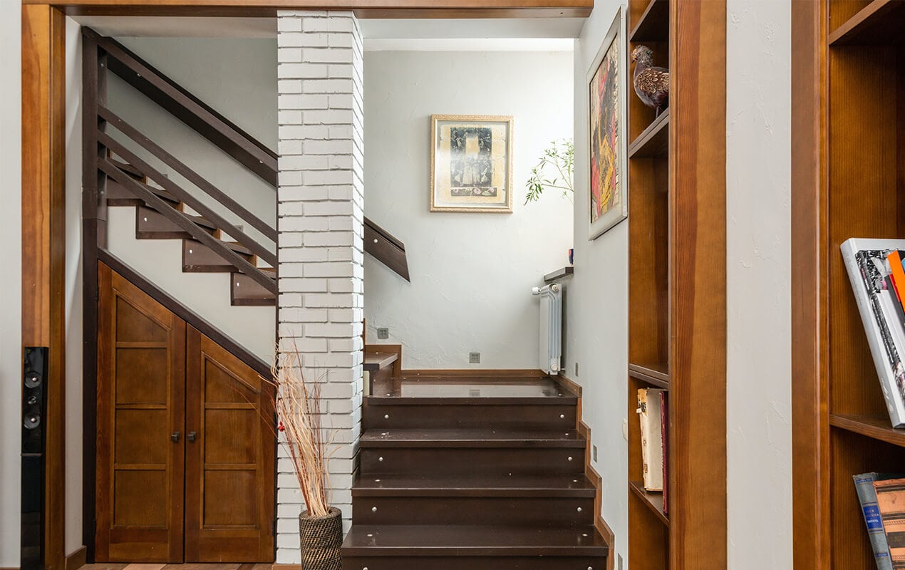 White brick column next to stairs