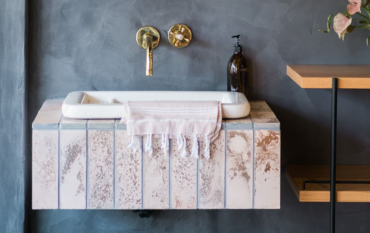 Rectangular floating sink with gold taps