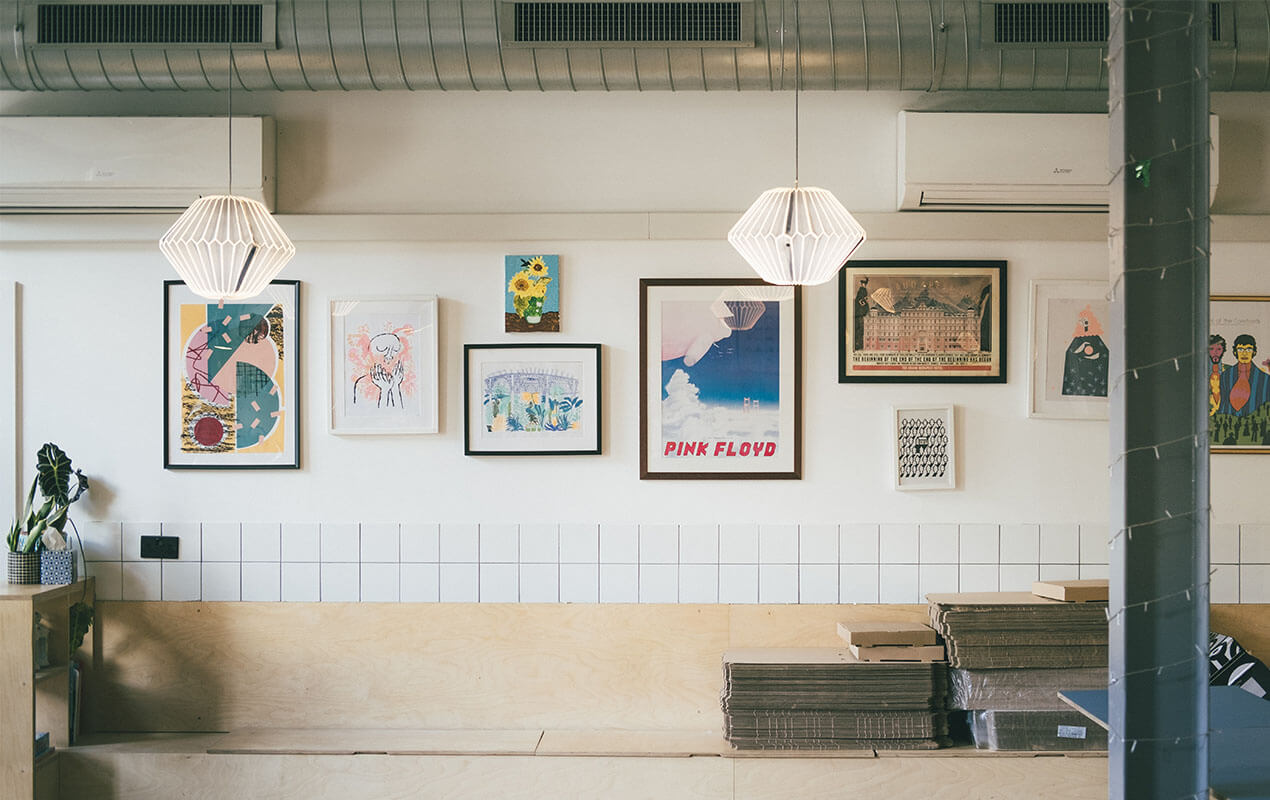 Interior wall with art and photos to bring your home to life