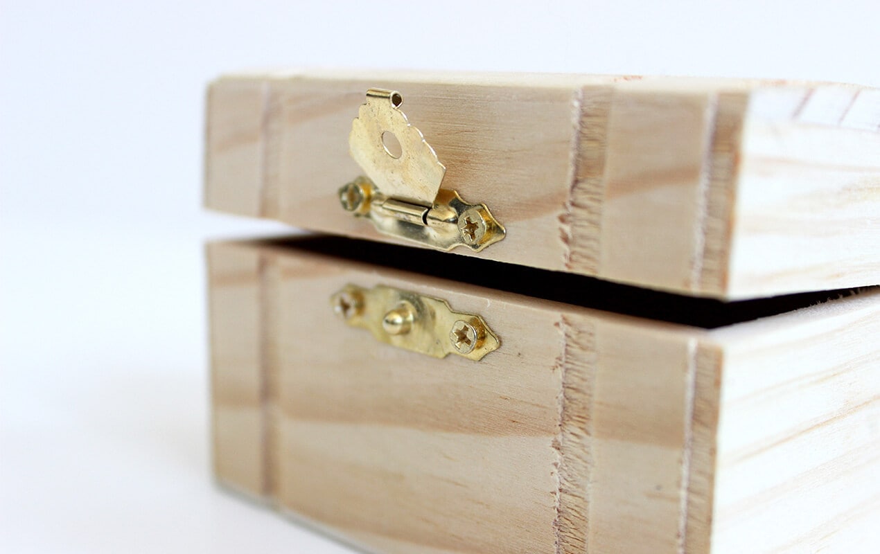 Homemade wooden jewellery box with gold clasp
