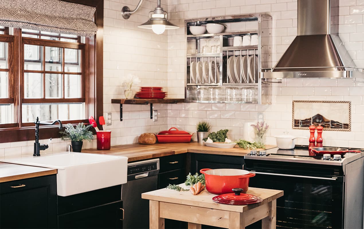 Black and white kitchen with red accessories