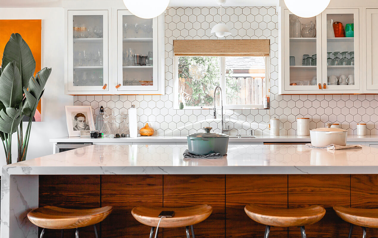 Kitchen Counter Décor with an island and stools