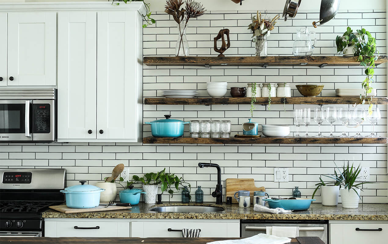 Kitchen design with plant decor and crockery