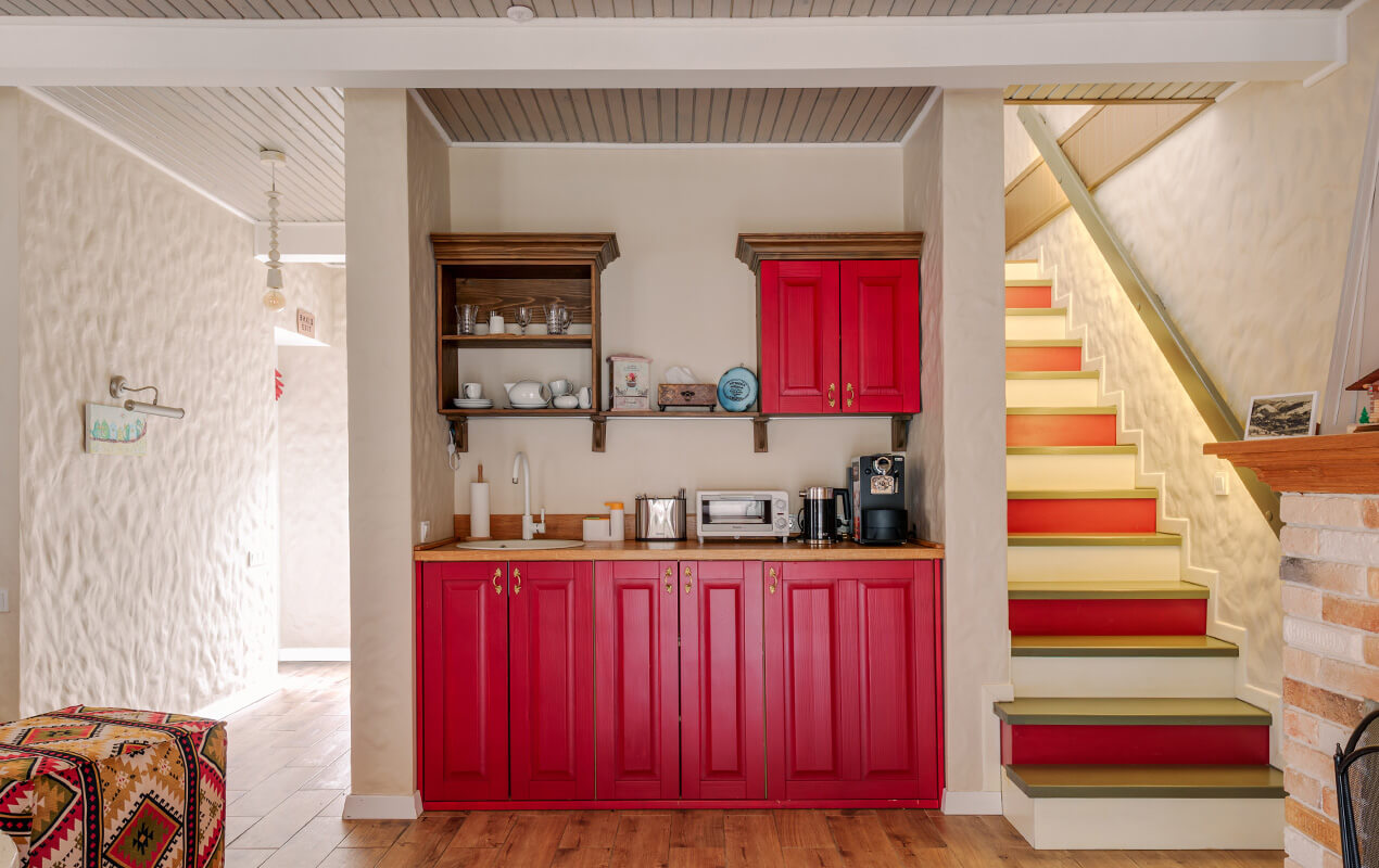 Wooden Kitchen Interior With Red Cabinets