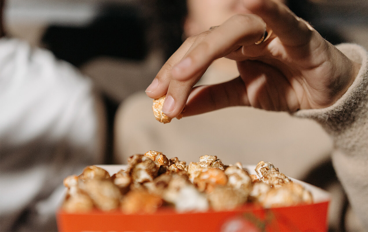 Person easting popcorn