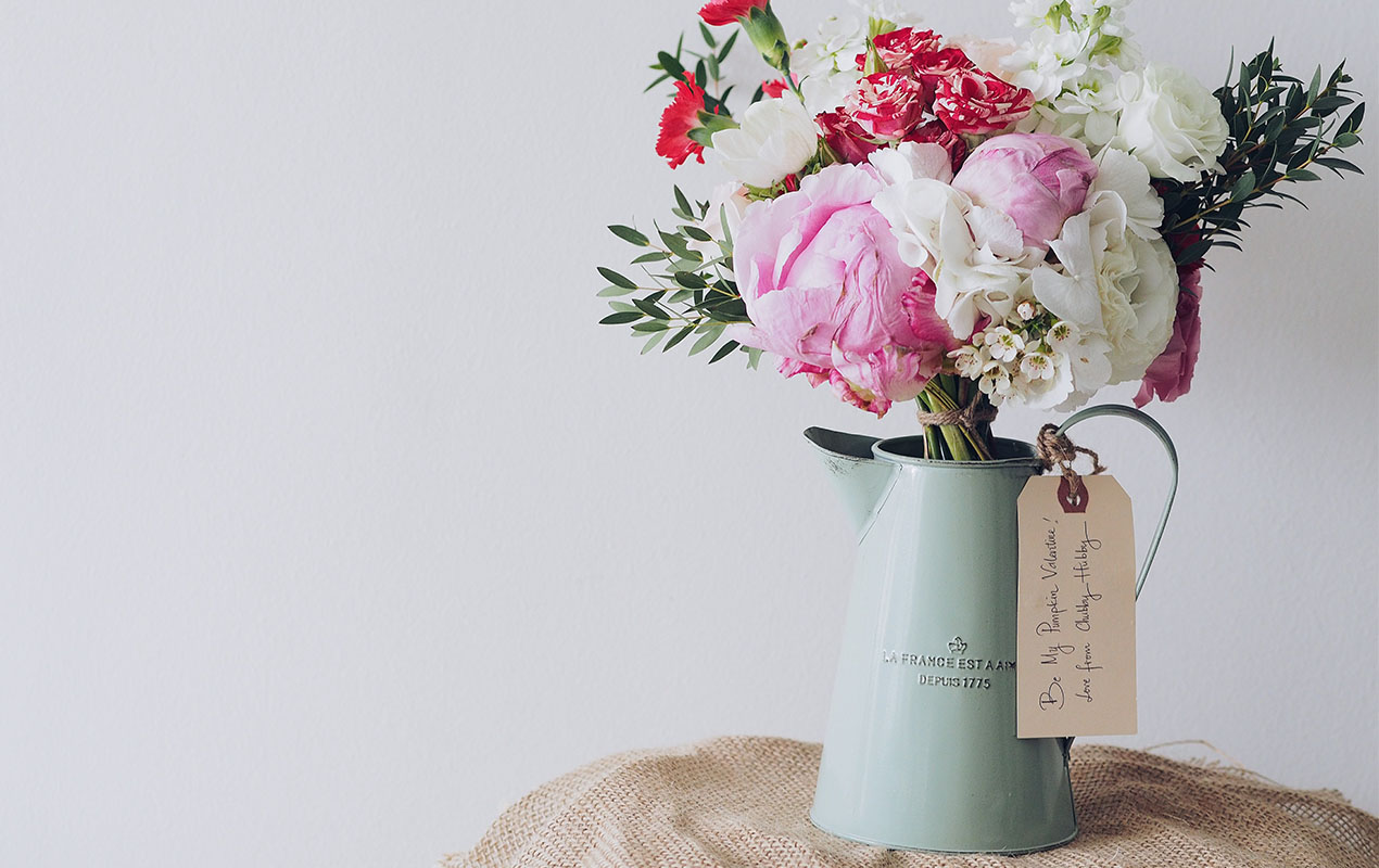 Vase and flowers on a table