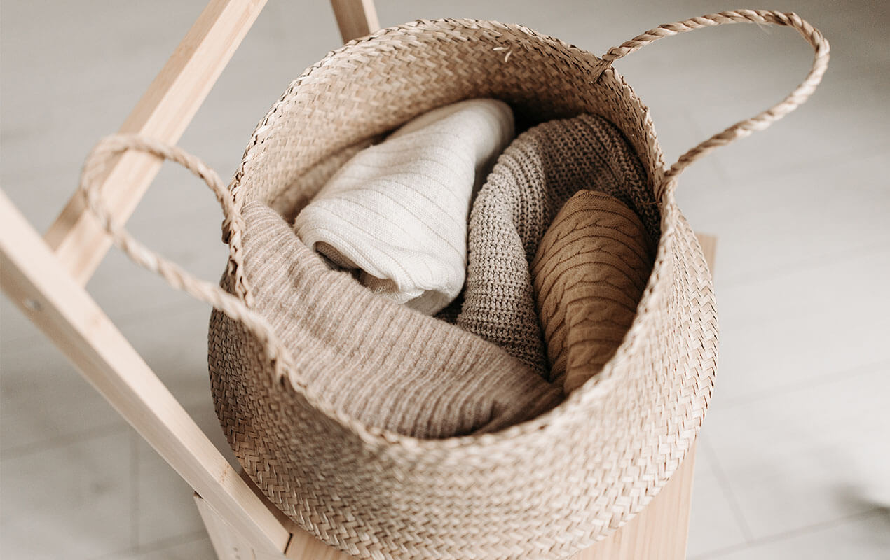 Woven storage basket on a chair for Rented Apartments
