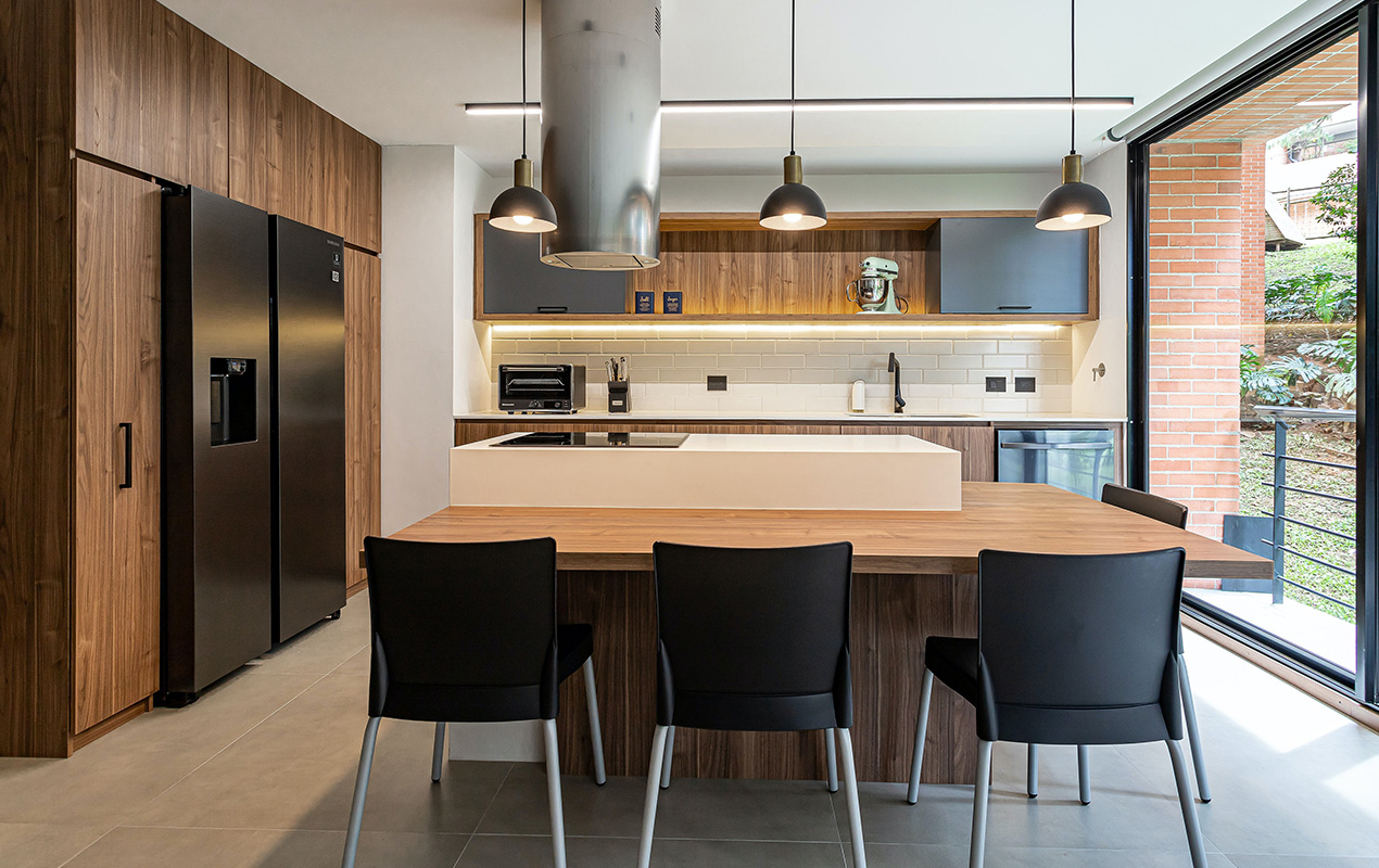 Kitchen island and dining room combo by DeCasa Collections