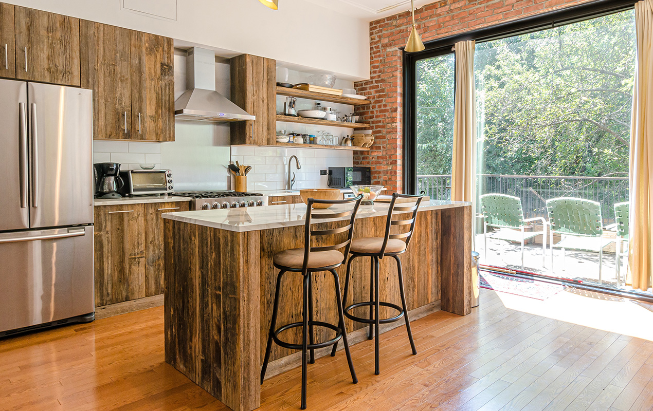 Rustic kitchen island by DeCasa Collections