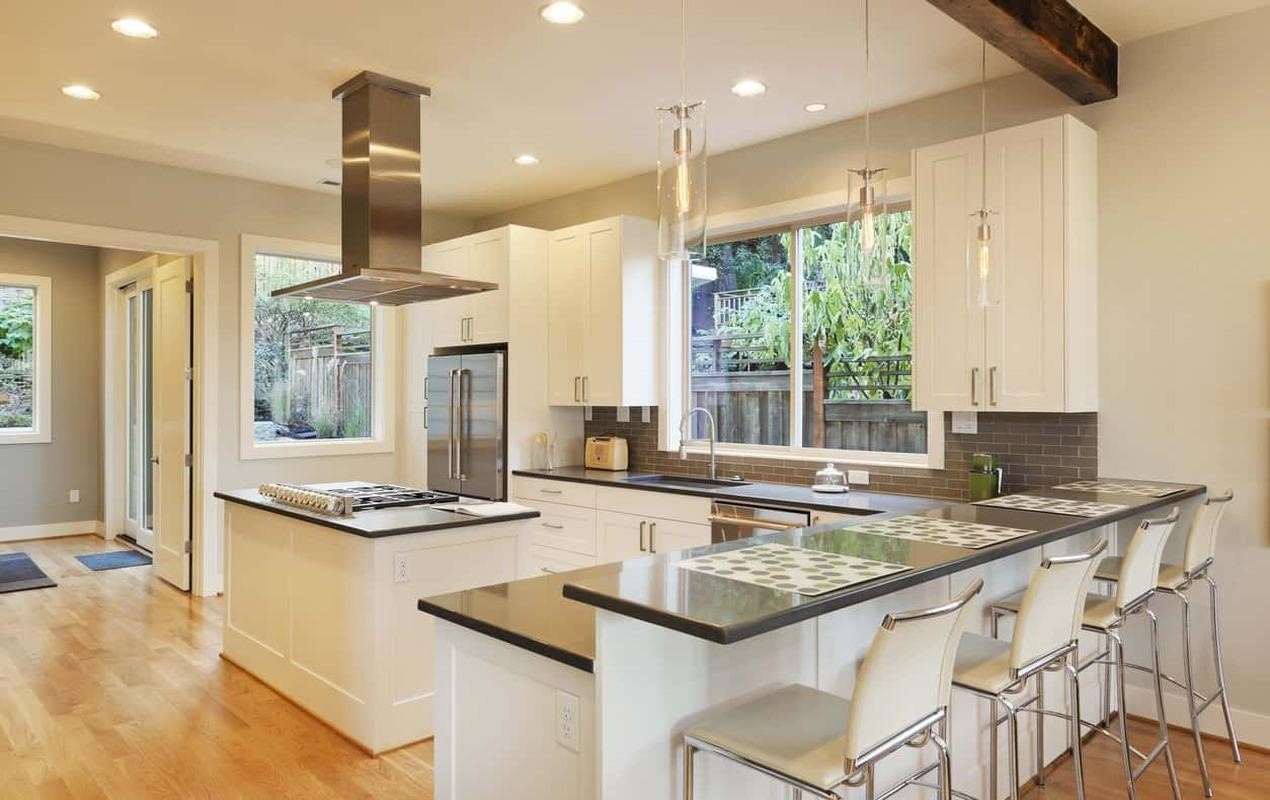 Kitchen interior with multiple counters by DeCasa Collections