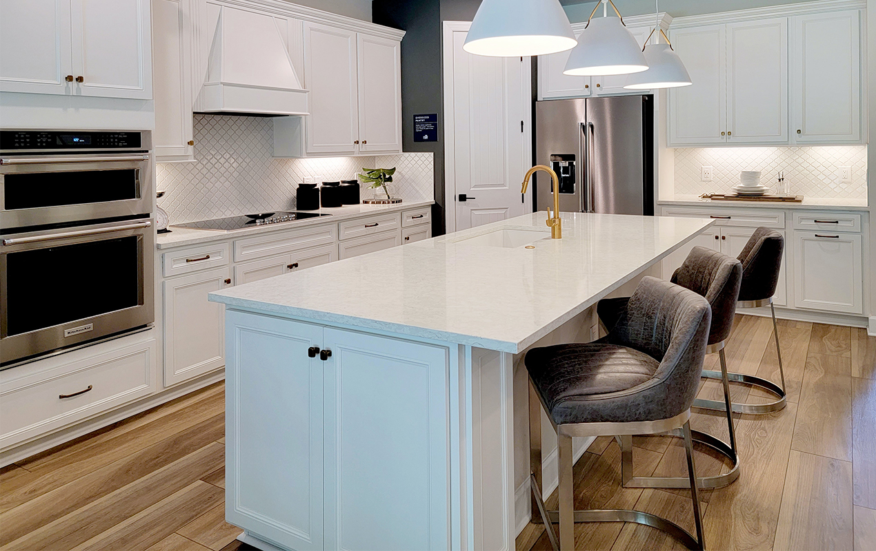 Kitchen island with end cabinets by DeCasa Collections