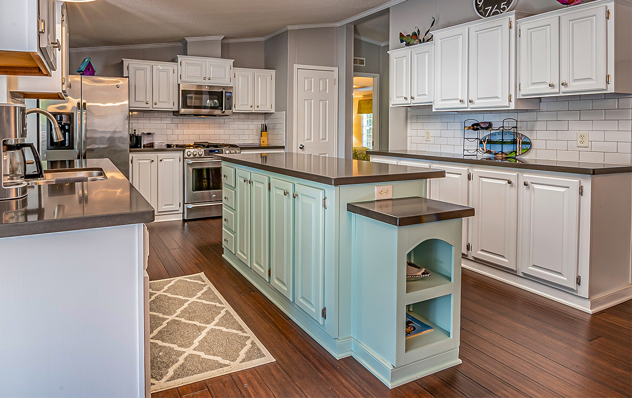 Rectangular kitchen island with cabinets by DeCasa Collections