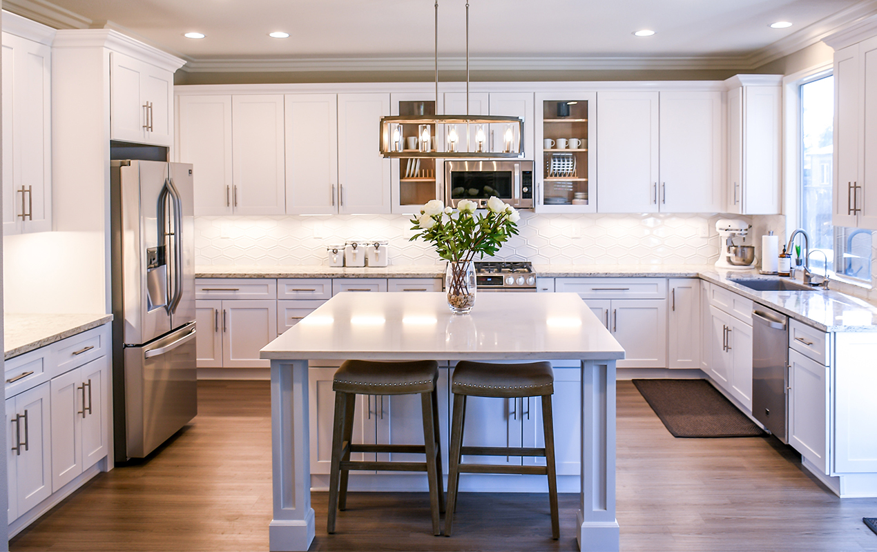 Square kitchen island design with two stools by DeCasa Collections