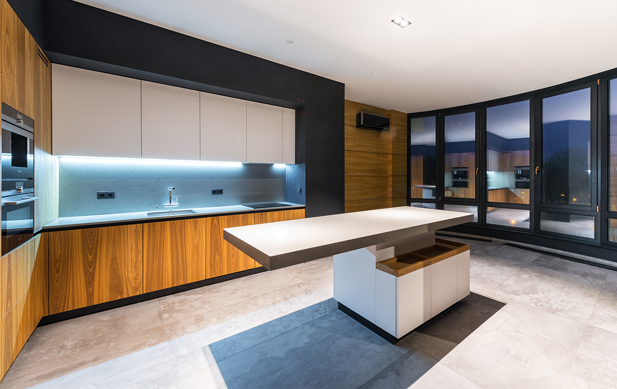 Modern interior with kitchen island by DeCasa Collection
