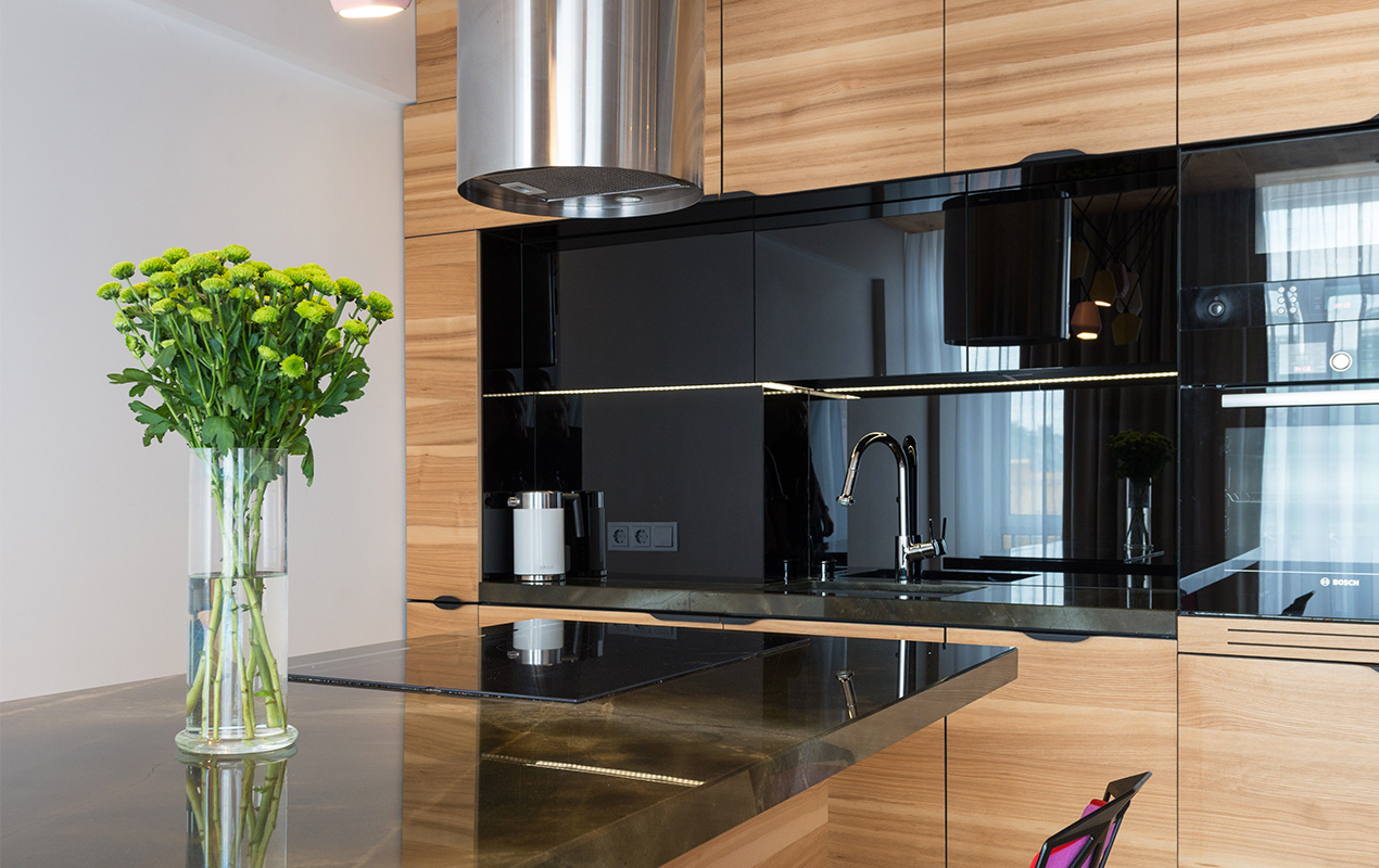 Modern wood kitchen with glossy appliances