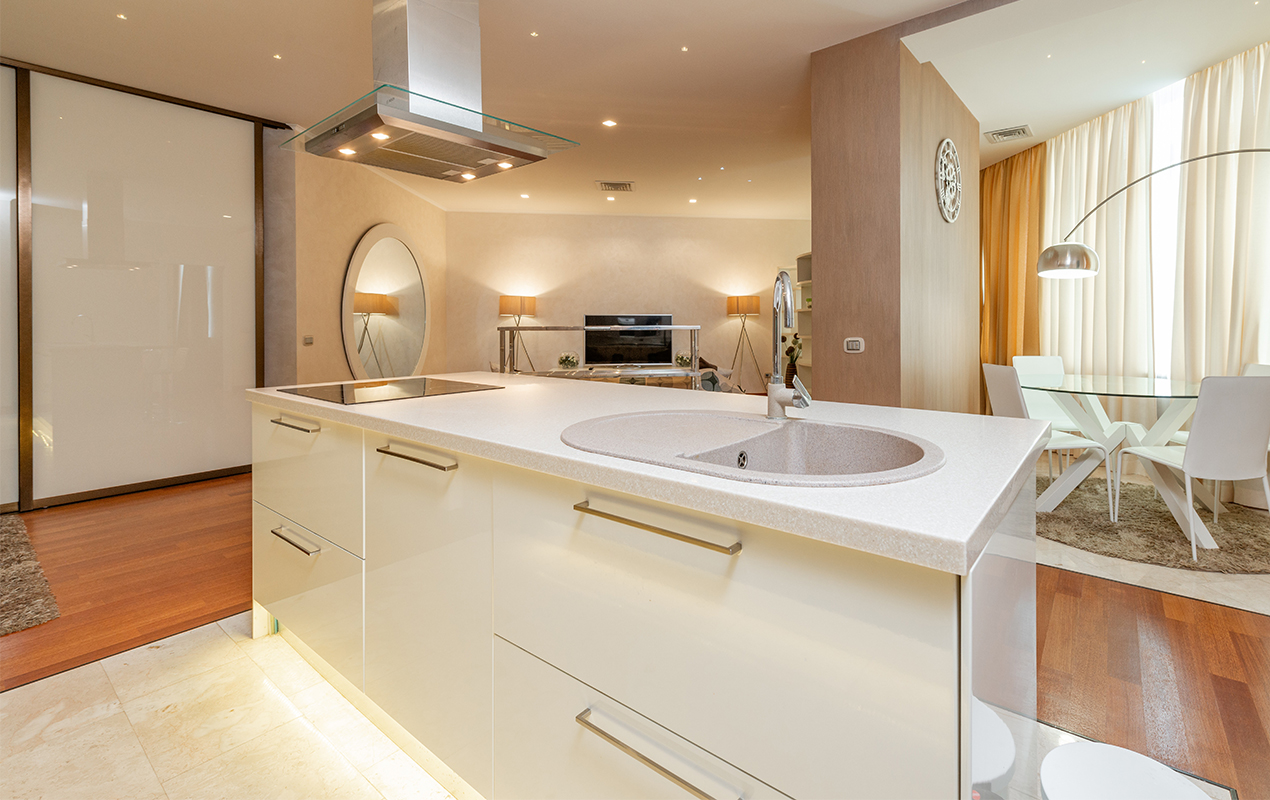 White kitchen island with built-in lighting