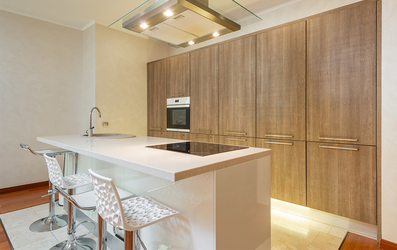 Wood kitchen interior with chrome and plastic seating by DeCasa Collections