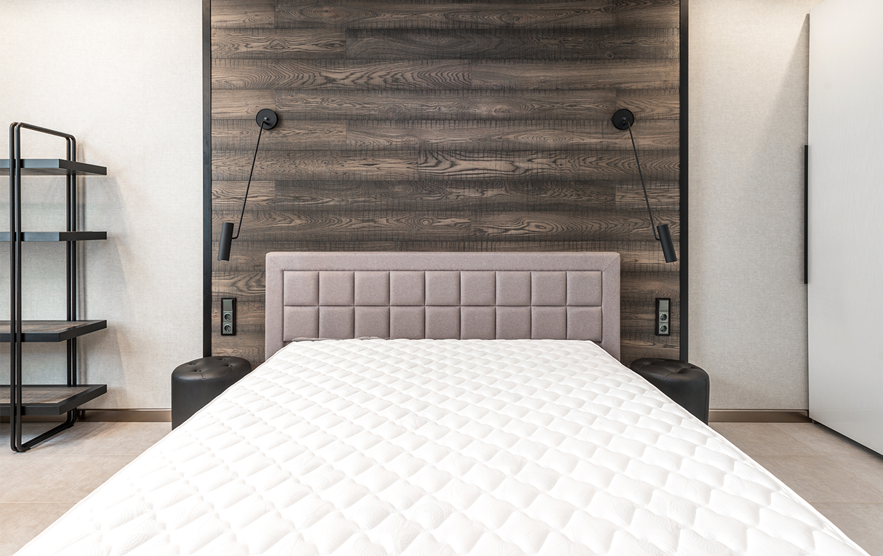 Bedroom design with bed and head board by DeCasa Collections