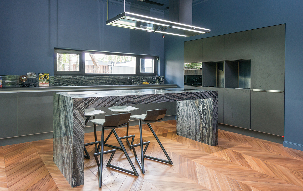 Blue kitchen with black accents by DeCasa Collections