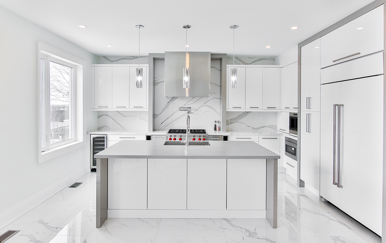 White kitchen design with storage by DeCasa Collections