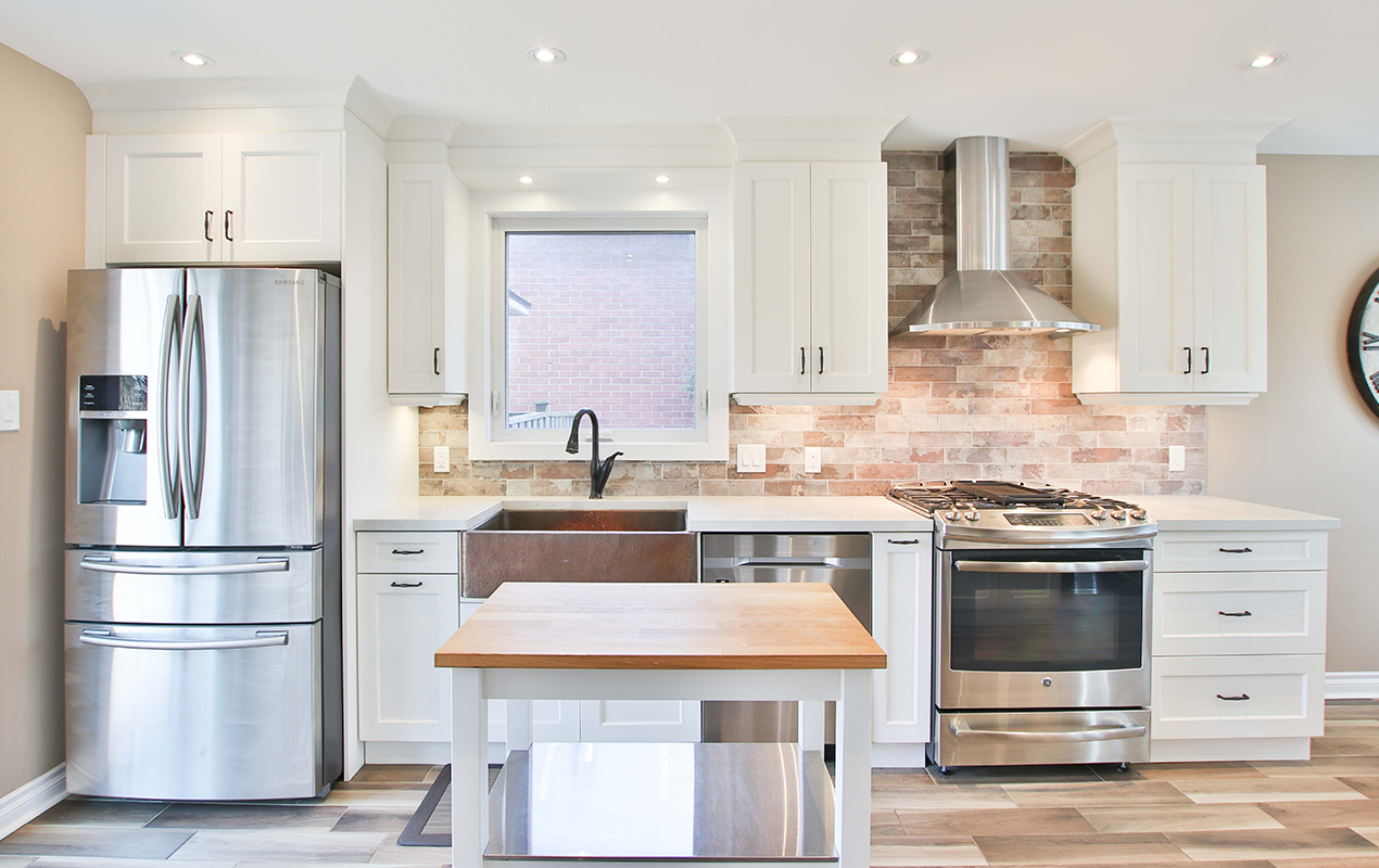 White and wood kitchen island with storage by DeCasa Collections