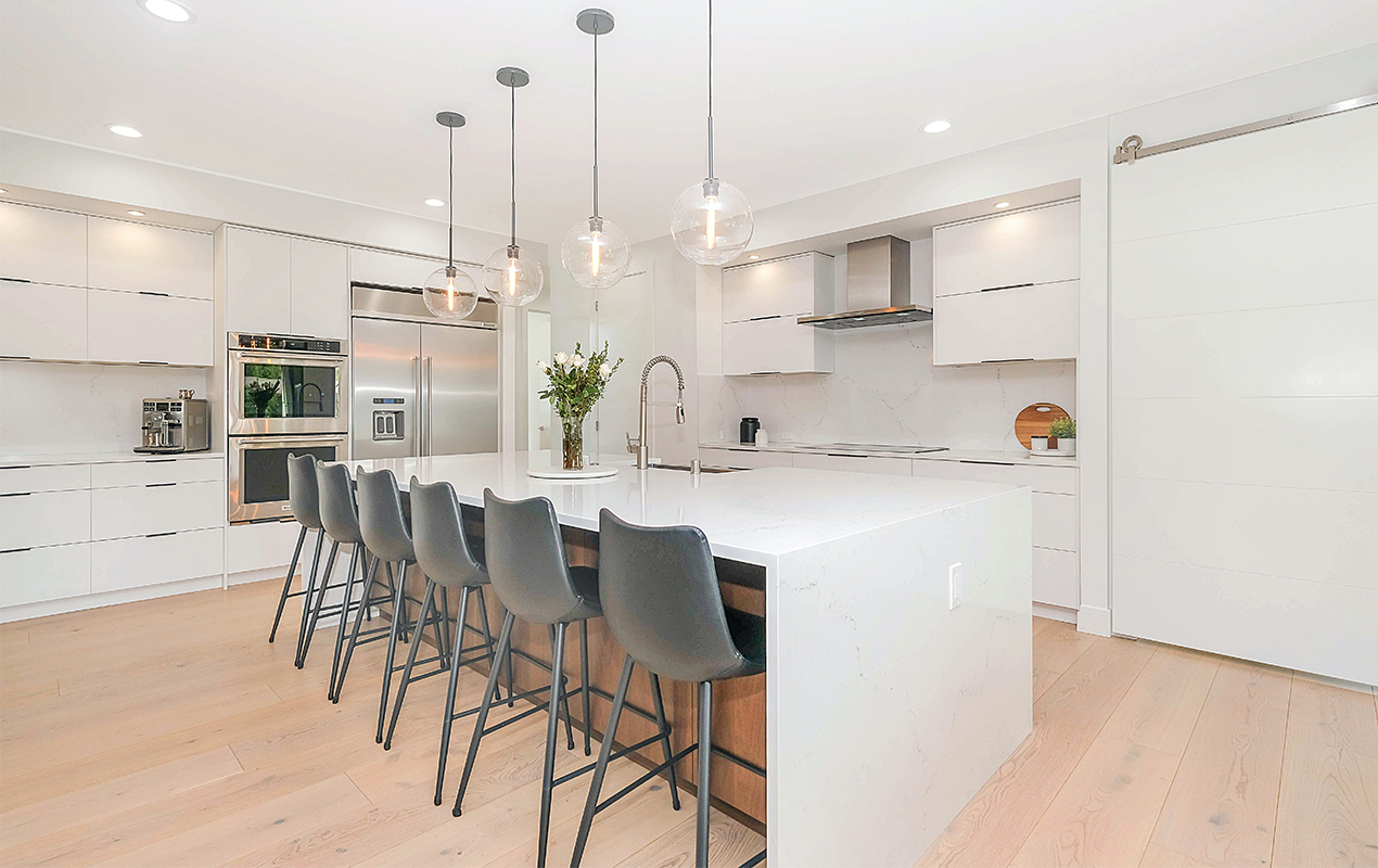 Kitchen interior with a 6 person seating area by DeCasa Collections