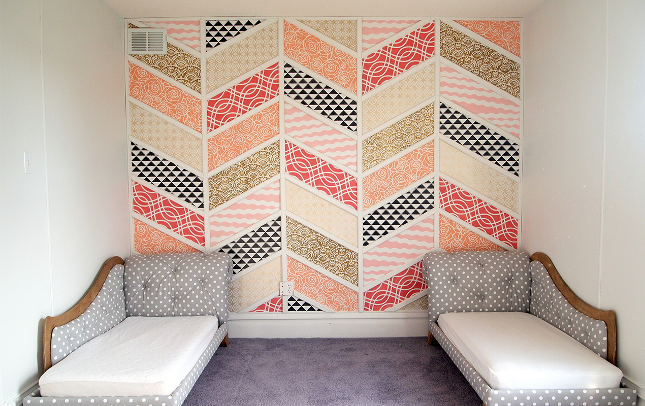 Bedroom interior with patchwork accent wall