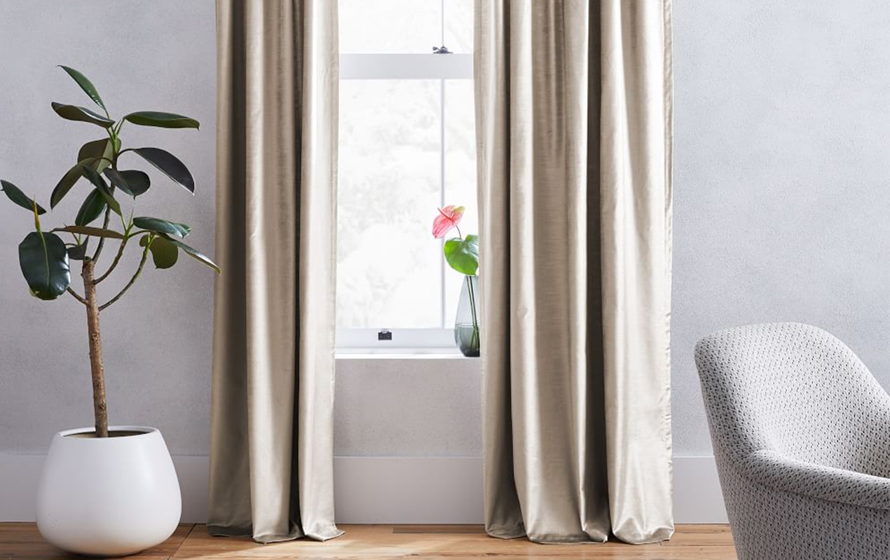 Living room with velvet curtains