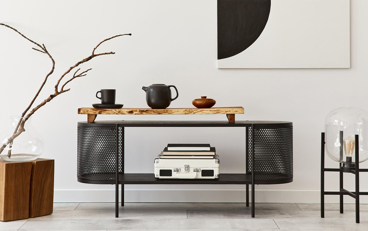 Console table with hot drinks and stereo player