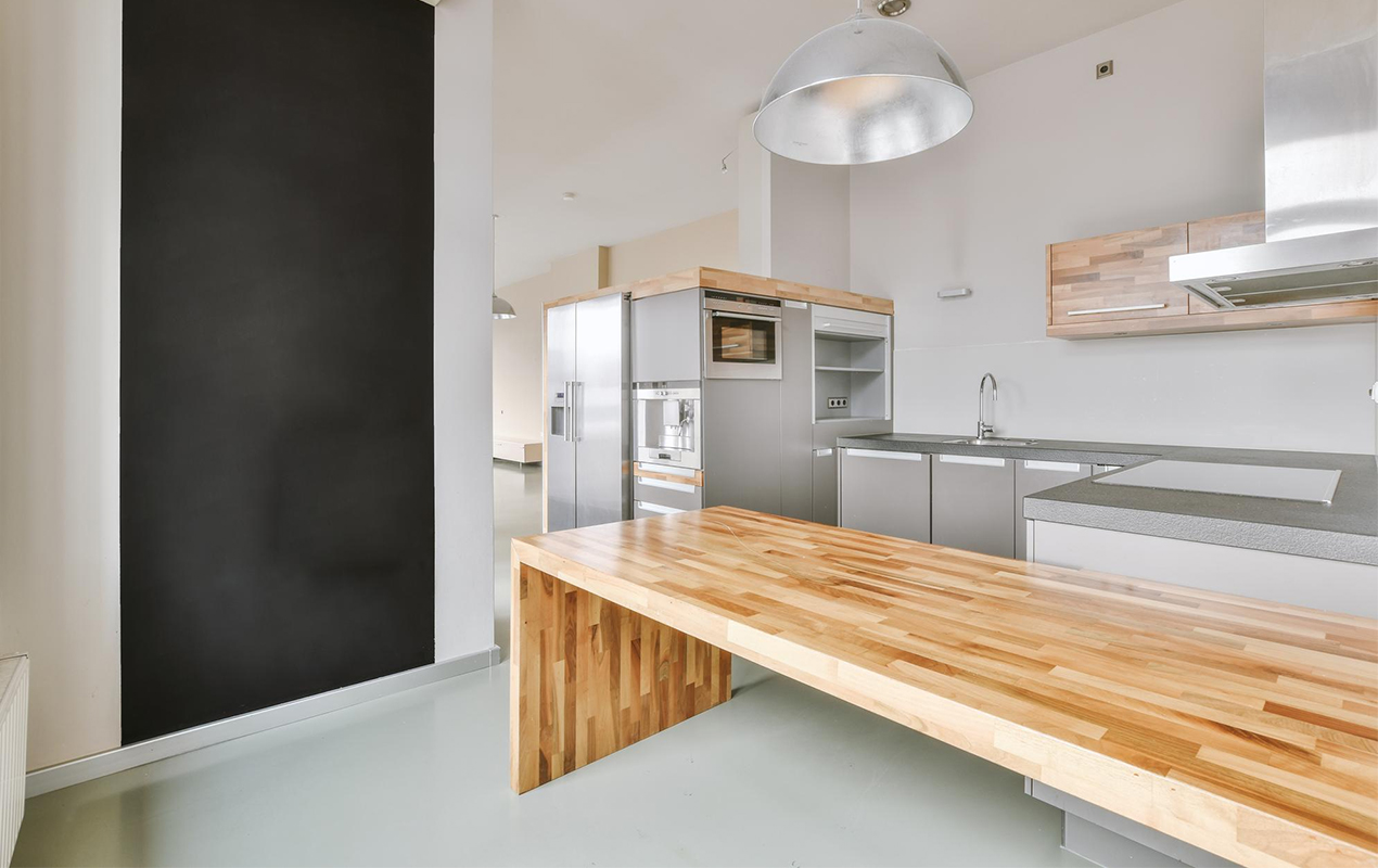 Freestanding wooden kitchen island by DeCasa Collections