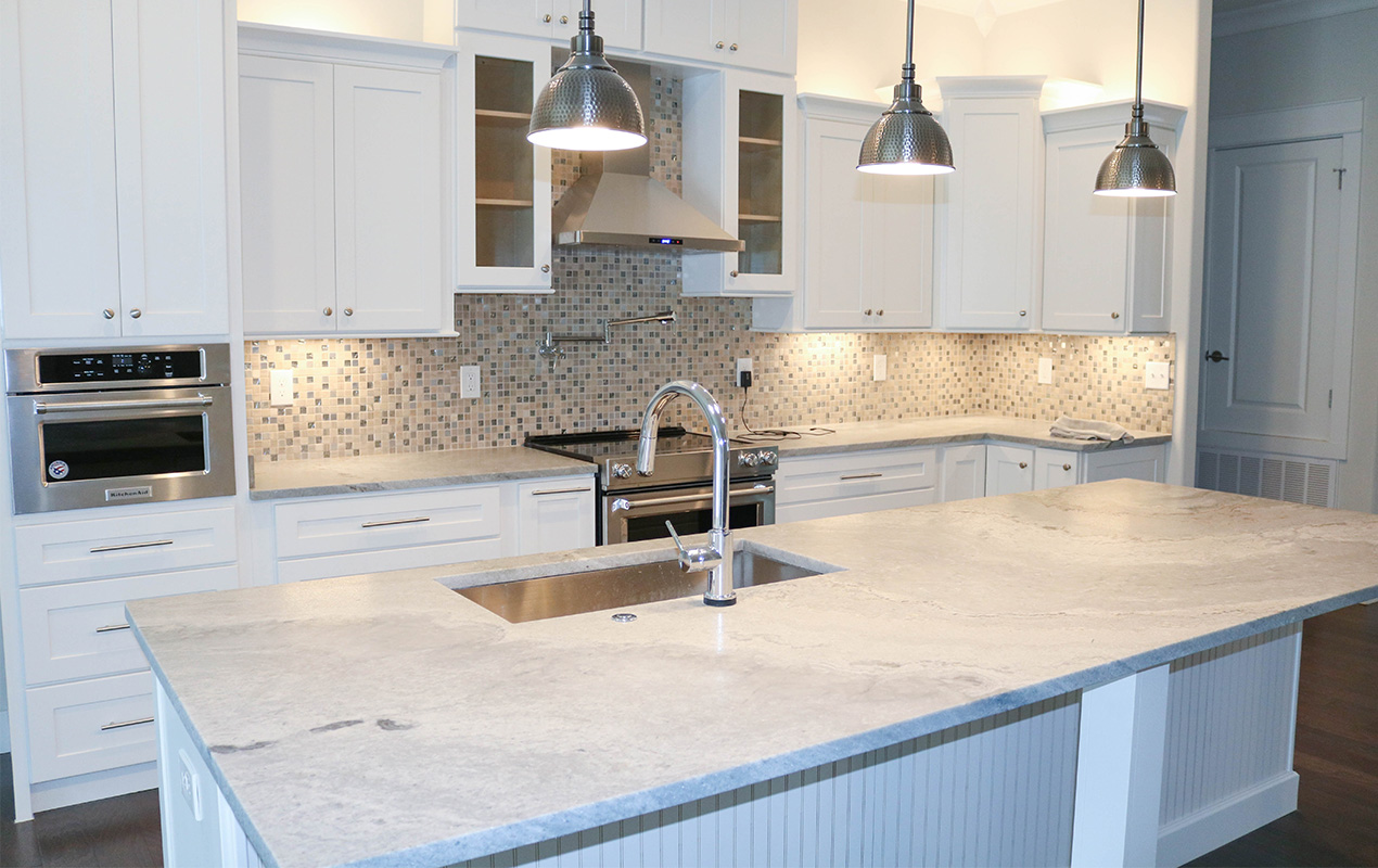 Neutral kitchen design by DeCasa Collections