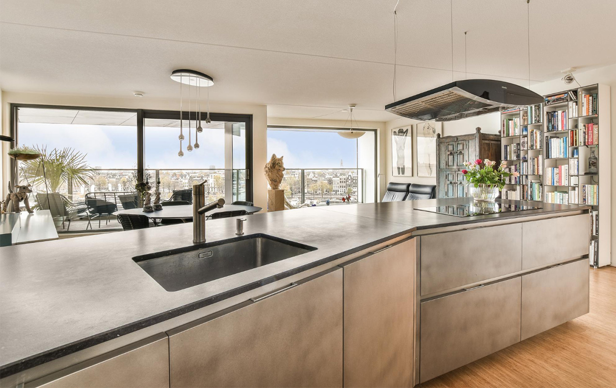 L shape kitchen island with in-built sink faucet by DeCasa Collections