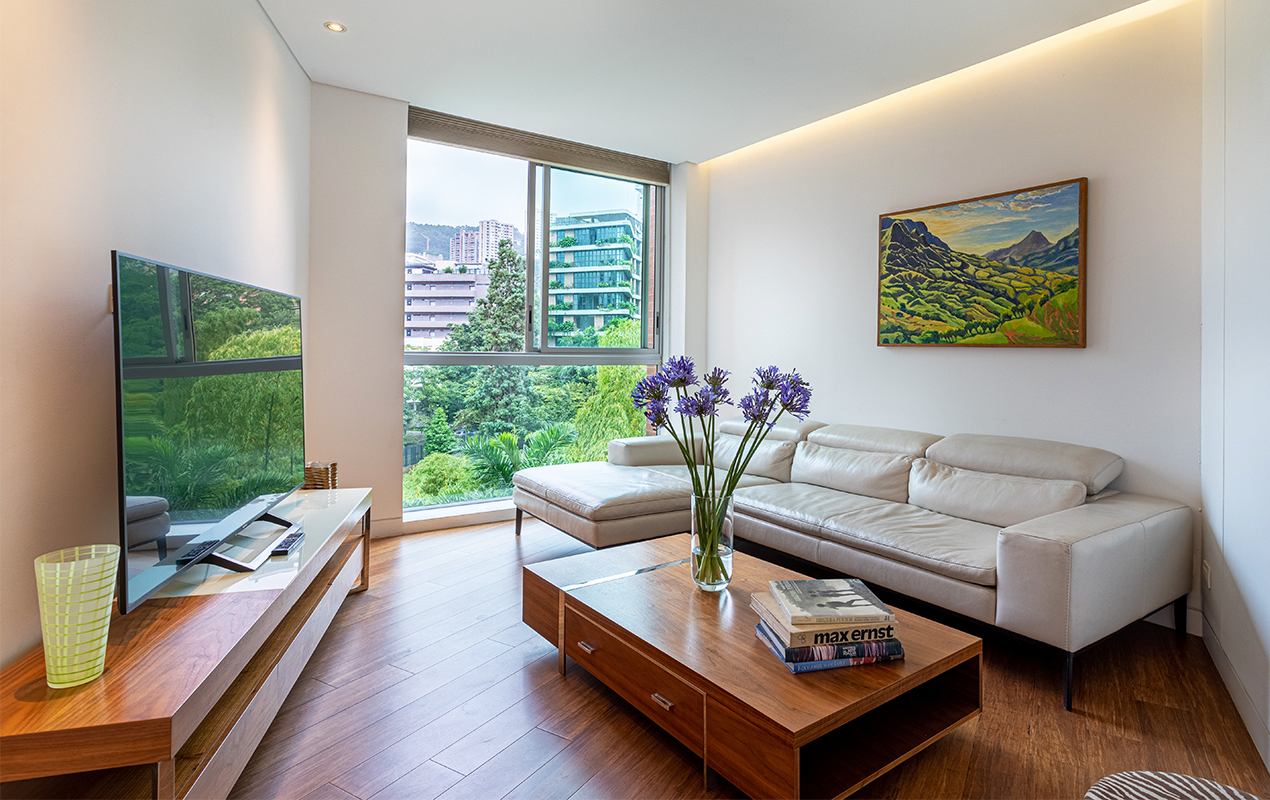 Apartment living with with tv, sofa, add coffee table