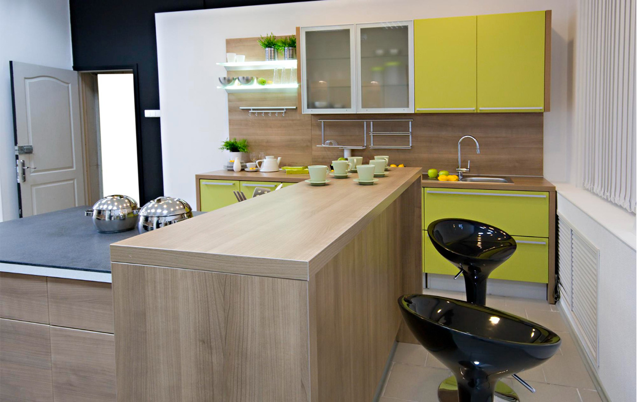 Wood interior with green cabinets by DeCasa Collections