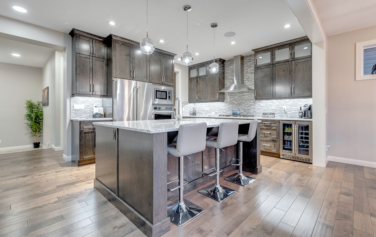 Gray interior with wood floor by DeCasa Collections