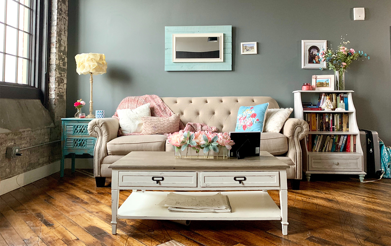 Sitting area with leather sofa and coffee table with storage