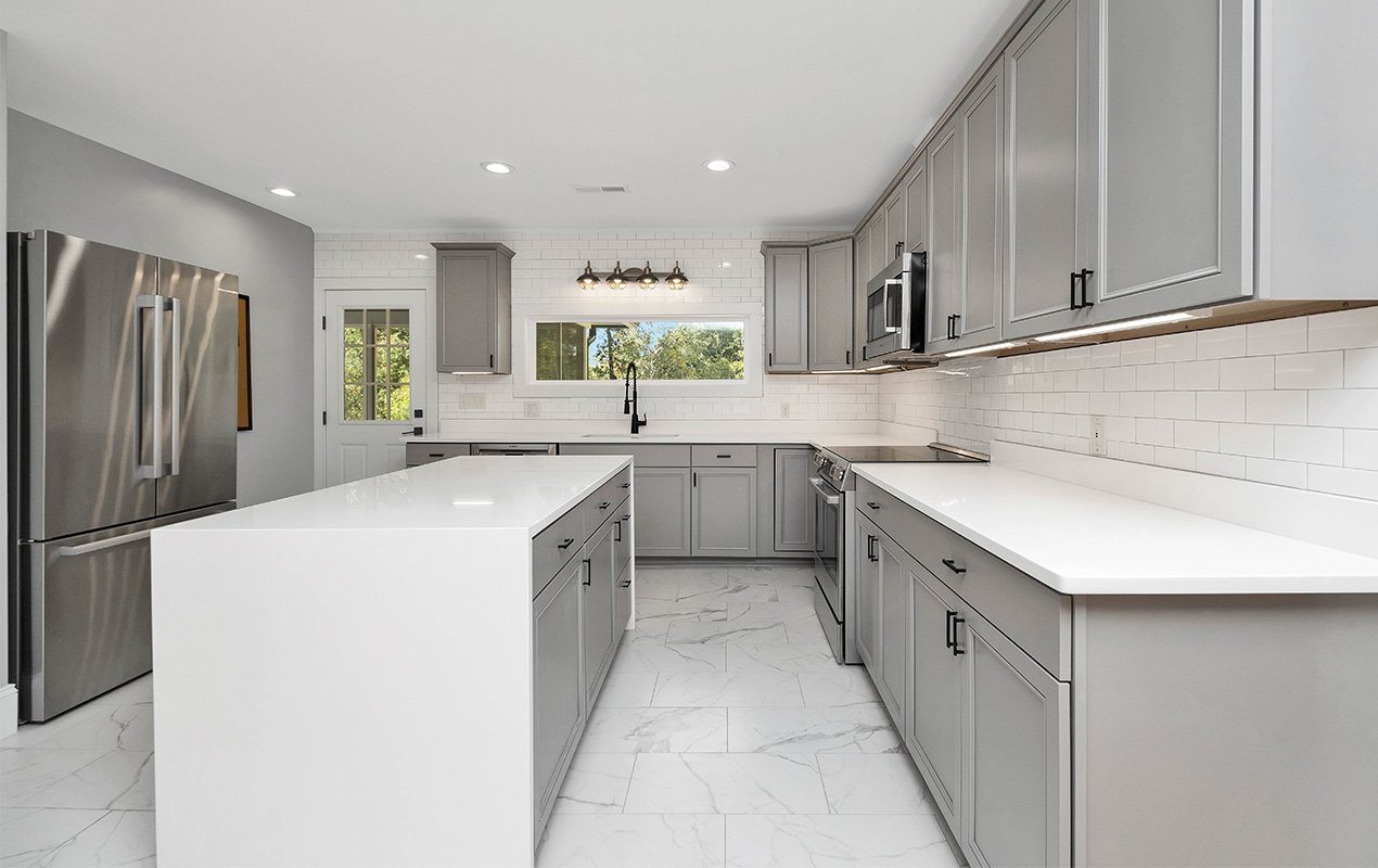 White and gray kitchen by DeCasa Collections
