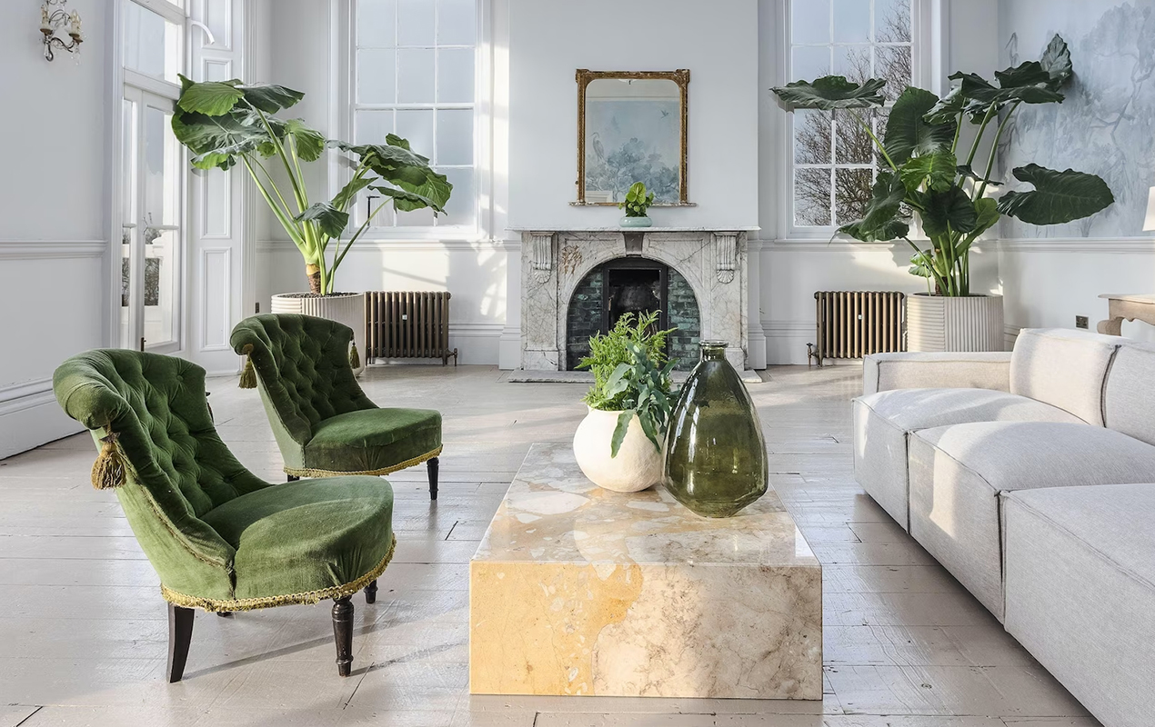 White living room interior with green accents 