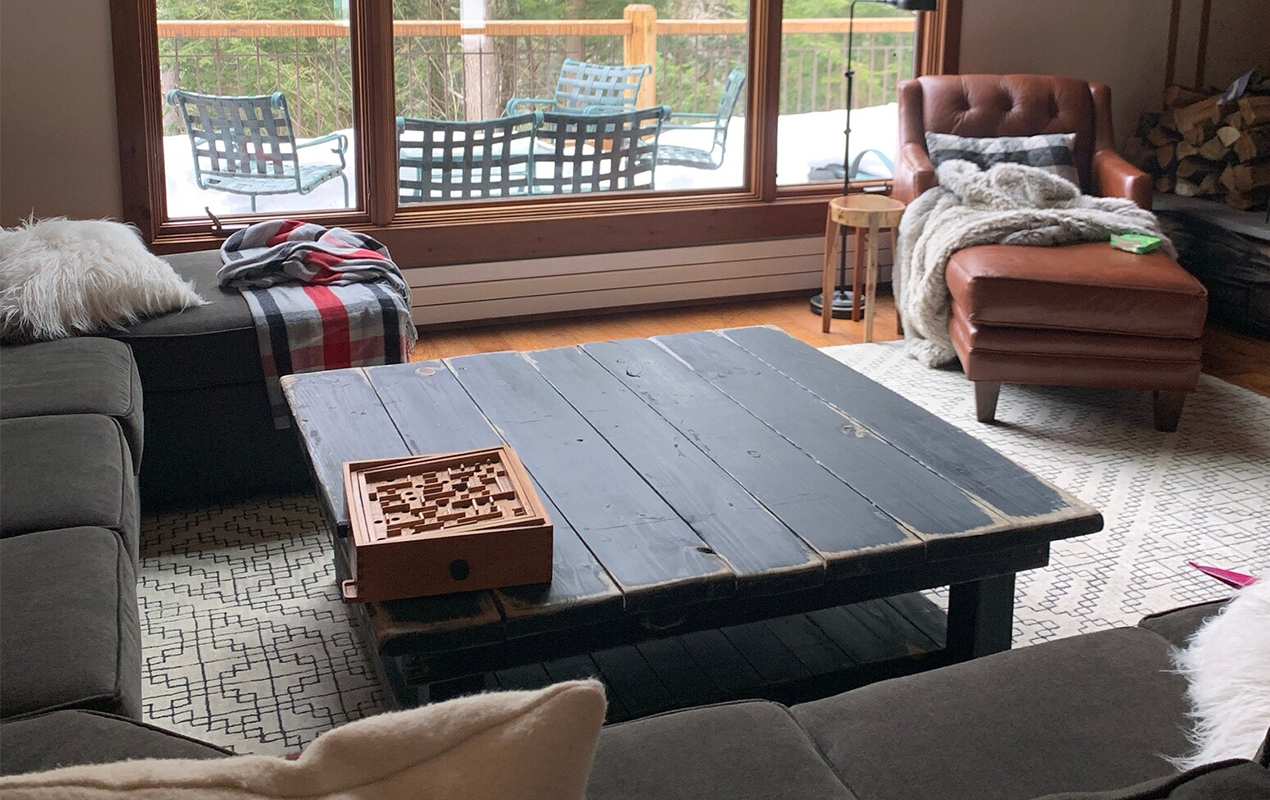 Living room with black farmhouse coffee table