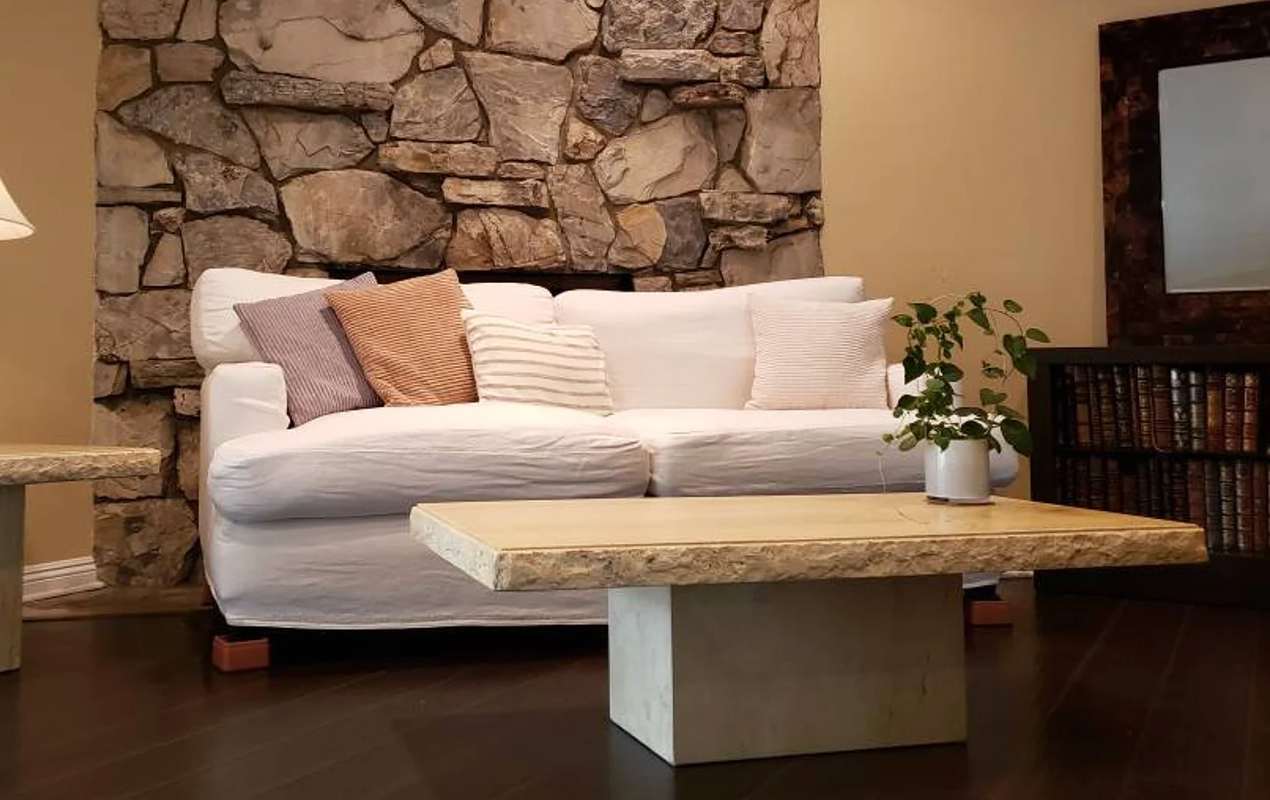 Natural living room interior with stone accent wall