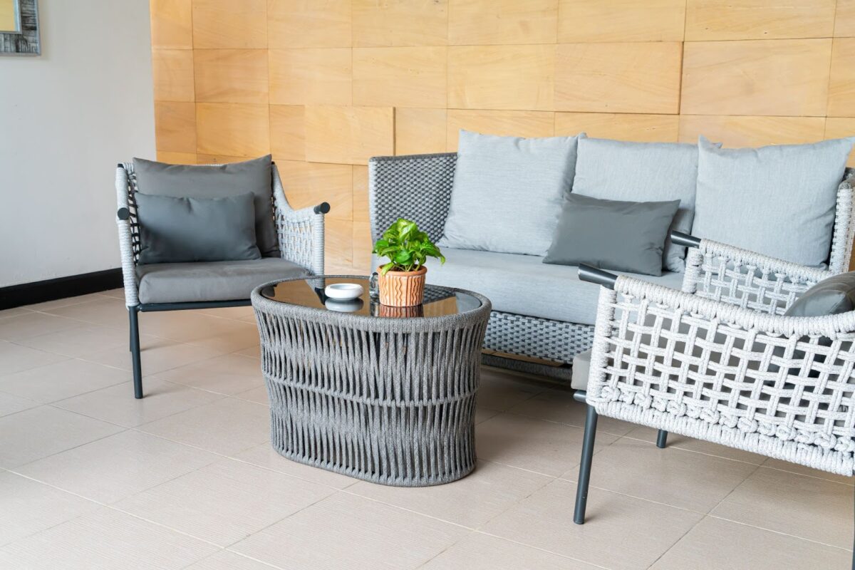 Gray interior with wicker furniture 
