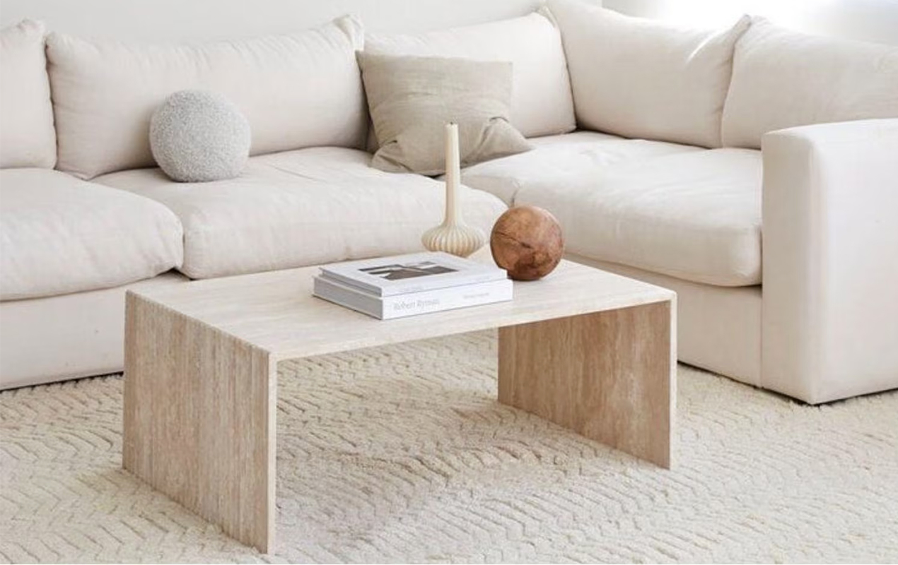 Living room design with waterfall style coffee table
